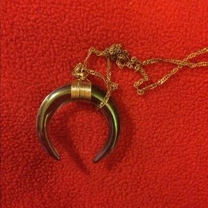 Gold plated green glass horn necklace
